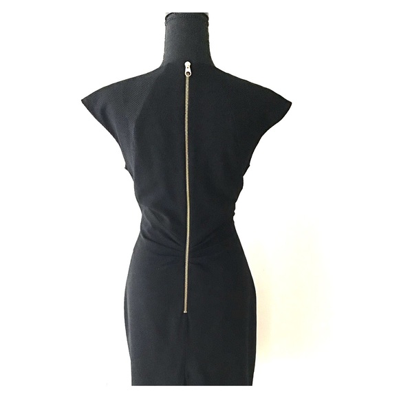 black dress with gold zipper in back